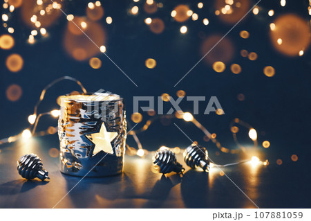 Christmas decorations with garland on dark background 107881059