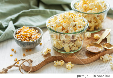 Tasty salted homemade popcorn Tasty salted homemade popcorn 107882168
