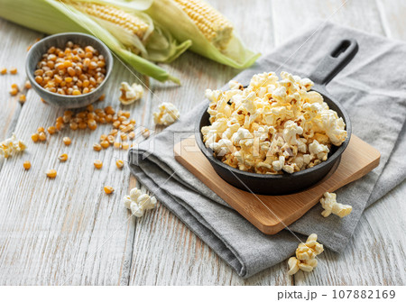 Tasty salted homemade popcorn Tasty salted homemade popcorn 107882169