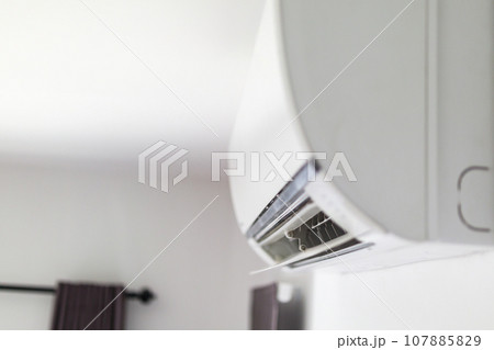 Air conditioner on white wall room interior background 107885829