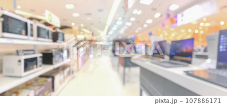 electronic department store show laptop computer and home appliance with bokeh light blurred background electronic department store show laptop computer and home appliance with bokeh light blurred background 107886171