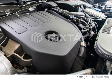 modern car engine under hood close up detail 107886760