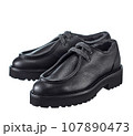 Stunning pair of men's derby boots made of thick black leather, with lacing, insulated with natural fur, on a high powerful, isolated on a white background. 107890473