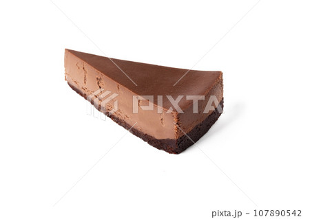 Slice of chocolate cheesecake on white background isolated top view 107890542