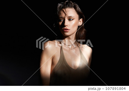 beautiful girl with wet hair. pretty young woman 107891804