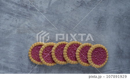 Cookies on a grey background Cookies on a grey background 107891929