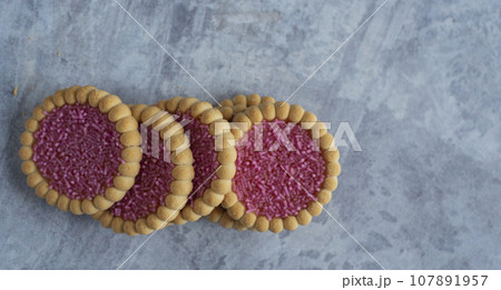 Cookies on a grey background Cookies on a grey background 107891957