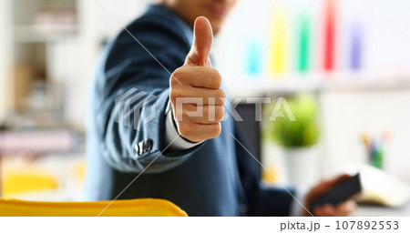 Male arm show OK or confirm during conference Male arm show OK or confirm during conference 107892553