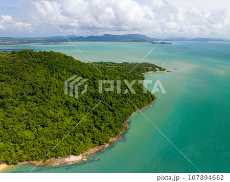 Aerial view seashore with mountains at Phuket Thailand, Beautiful seacoast view at open sea in summer season,Nature recovered Environment and Travel background Aerial view seashore with mountains at Phuket Thailand, Beautiful seacoast view at open sea in summer season,Nature recovered Environment and Travel background 107894662