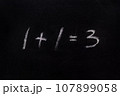 Wrong sum 1 1 3 written blackboard equation one plus one equals three written black board. Incorrect sum 1 plus 1 equals 3 writing chalkboard background. Buy two get one free. Simple math. Add. Sale 107899058