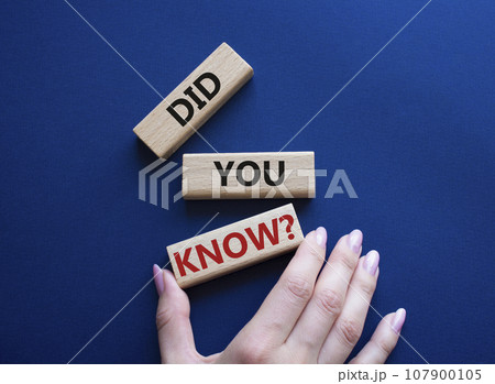 Did you know symbol. Wooden blocks with words Did you know. Businessman hand. Beautiful deep blue background. Business and Did you know concept. Copy space. Did you know symbol. Wooden blocks with words Did you know. Businessman hand. Beautiful deep blue background. Business and Did you know concept. Copy space. 107900105