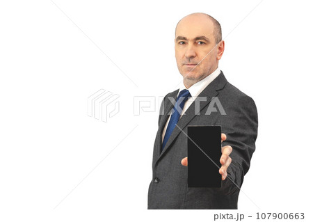 serious man with a tablet. businessman holding touchpad serious man with a tablet. businessman holding touchpad 107900663