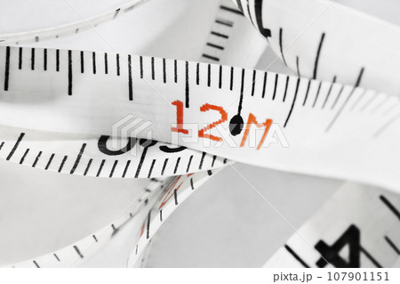 Measuring tape with number 12 Measuring tape with number 12 107901151