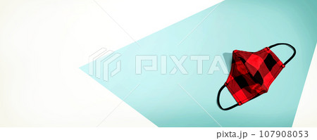 Red flannel face mask overhead view 107908053
