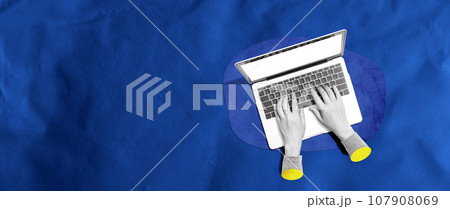 Person using a laptop computer Person using a laptop computer 107908069