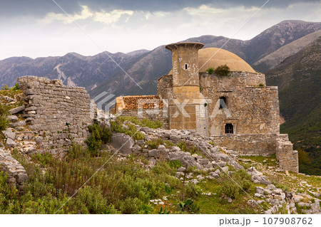 Remains of ancient mosque on rocky hilltop near Borsh village Remains of ancient mosque on rocky hilltop near Borsh village 107908762