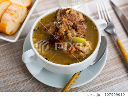 Top view of mushroom soup in bowl on table Top view of mushroom soup in bowl on table 107909010