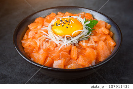 salmon and rice with a yolk, or ikuradon in Japanese 107911433
