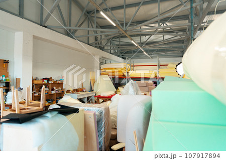 Stacked materials for furniture upholstery in furniture factory Stacked materials for furniture upholstery in furniture factory 107917894