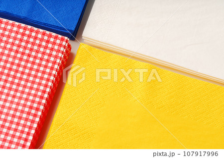 Colorful square paper napkins background top view 107917996