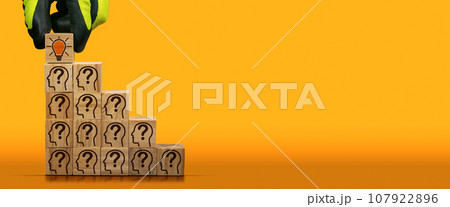 Concept of Creative Idea and Innovation with Question Marks and Light Bulb 107922896