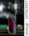 Desirable Alcoholic and Non-Alcoholic Cocktails on the Bar Counter, Adorned with Colorful, Natural, and Healthy Ingredients and Fruit Garnishes 107923057