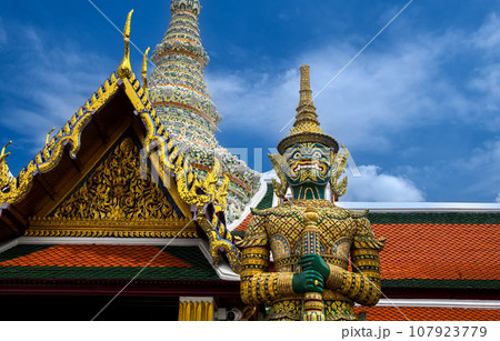 Giant statue in the Temple of the Emerald Buddha. Giant statue in the Temple of the Emerald Buddha. 107923779