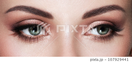 Beautiful female eyes with long eyelashes Beautiful female eyes with long eyelashes 107929441