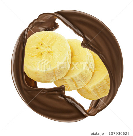 Banana slices and round chocolate splash isolated on white background 107930622