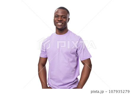 young shy handsome american man dressed in a light lilac basic t-shirt on a white background with young shy handsome american man dressed in a light lilac basic t-shirt on a white background with 107935279