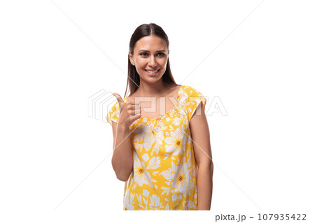 brunette young woman dressed in summer outfit smiling cute on white background 107935422