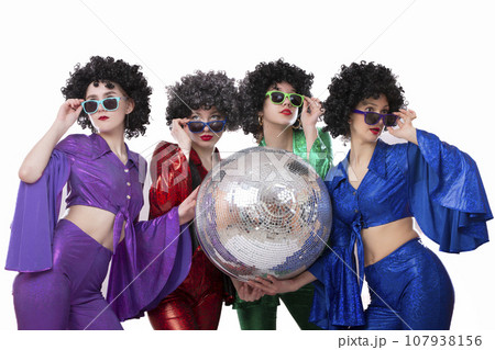 Group of funny girls in disco style, with disco ball, halloween party, on white background. 107938156