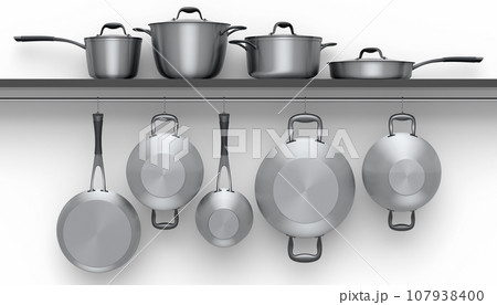 Set of stewpot, frying pan and chrome plated cookware hanging on shelf on white 107938400