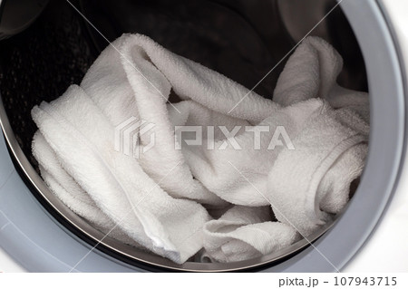 Used towel in washing machine Used towel in washing machine 107943715