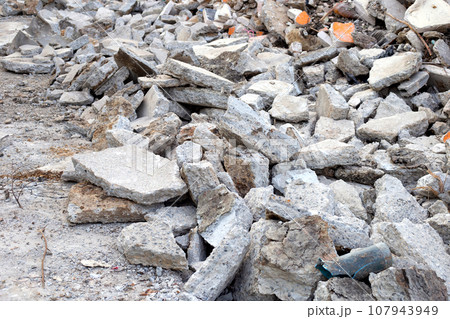 Piles of rubble after house demolition 107943949