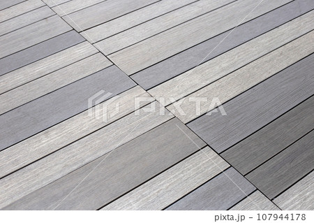 Brown floor tiles wooden texture 107944178