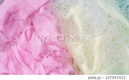 Clothes soak in powder detergent water dissolution, washing colored clothes 107945022