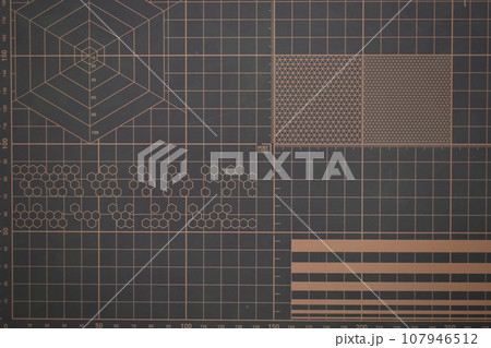 closeup brown cutting mat, equipment in office closeup brown cutting mat, equipment in office 107946512