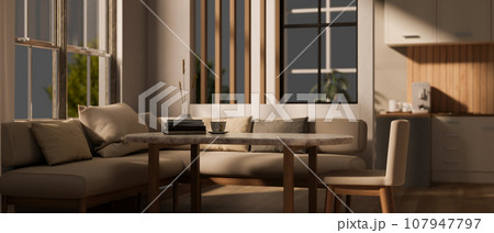 Interior design of a modern and comfortable living room with a kitchen in the back. 107947797