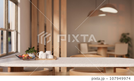 Copy space on a dining table in a cosy Scandinavian dining room in a cafe or restaurant. 107949974