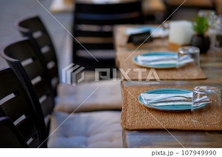 Table set for an event party or wedding reception in a restaurant. 107949990