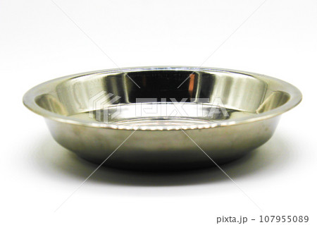 Stainless Steel plates on white background with selective focus 107955089