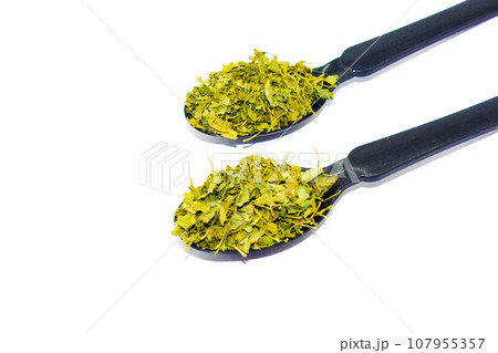 kasuri methi on white background with selective focus 107955357