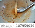 The Empty blow after eating finished. empty blow with chopstick. 107959039