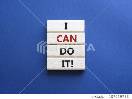 I can do it symbol. Concept words I can do it on wooden blocks. Beautiful deep blue background. Business and I can do it concept. Copy space. I can do it symbol. Concept words I can do it on wooden blocks. Beautiful deep blue background. Business and I can do it concept. Copy space. 107959758