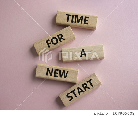 Time for a new start symbol. Wooden blocks with words Time for a new start. Beautiful pink background. Business and Time for a new start concept. Copy space. Time for a new start symbol. Wooden blocks with words Time for a new start. Beautiful pink background. Business and Time for a new start concept. Copy space. 107965008