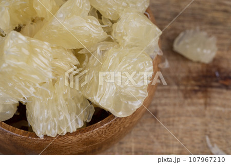 peeled pomelo on the table, close up 107967210