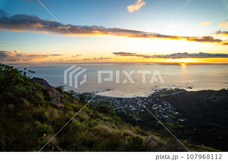 View of Camps bay from Kloof Corner hike at sunset in Cape Town, Western Cape, South Africa View of Camps bay from Kloof Corner hike at sunset in Cape Town, Western Cape, South Africa 107968112