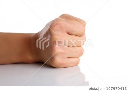 Male clenched fist isolated on white background 107970418