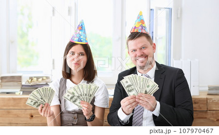 A man and a woman enjoy light money A man and a woman enjoy light money 107970467